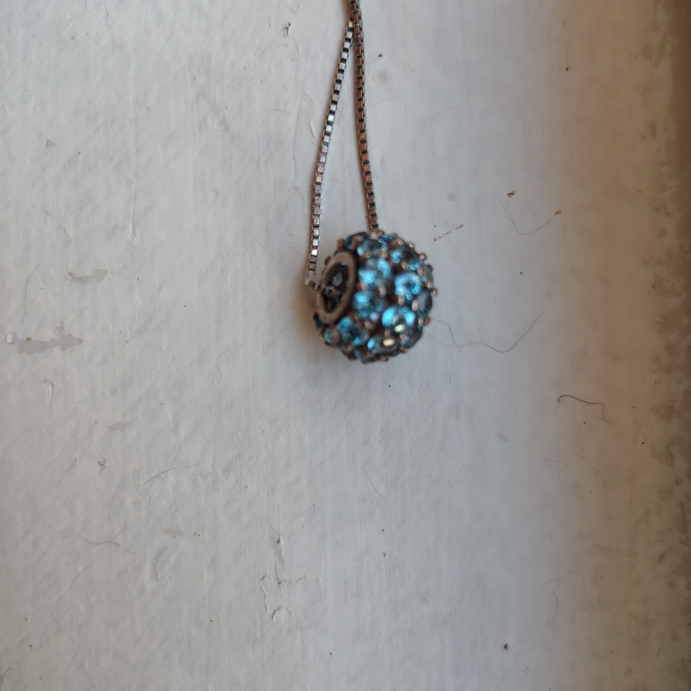 Dazzling Blue Topaz Beaded Glitter Ball.